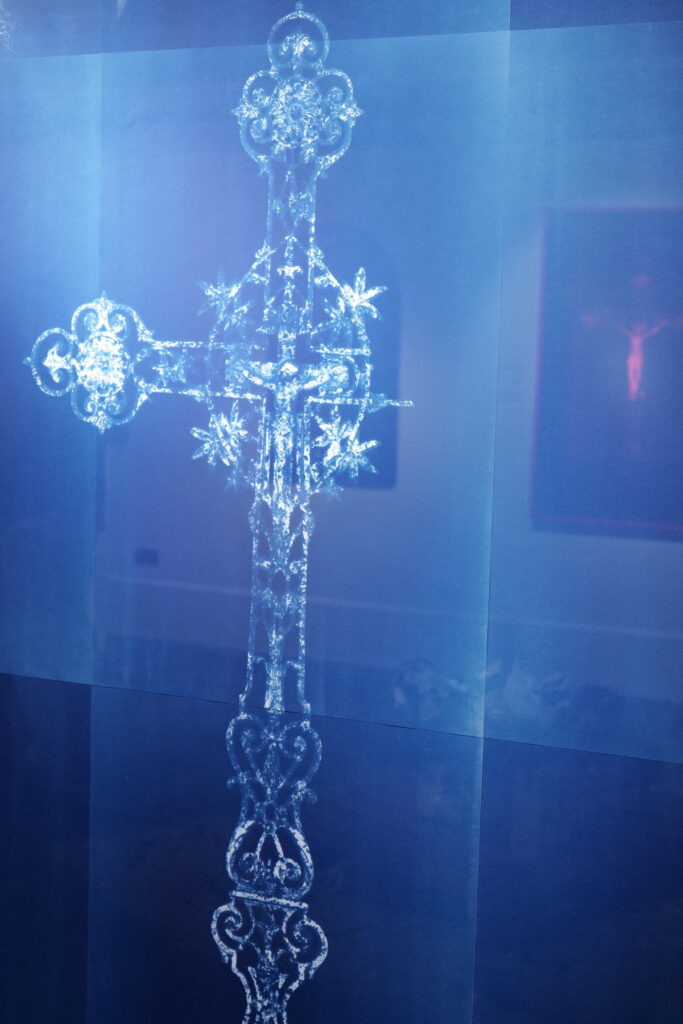 Blue cyanotype of an ornate crucifix