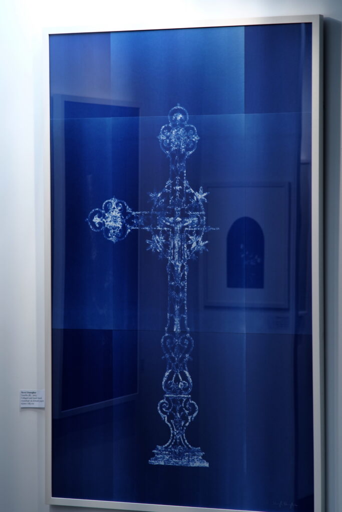 Large blue cyanotype of an ornate crucifix