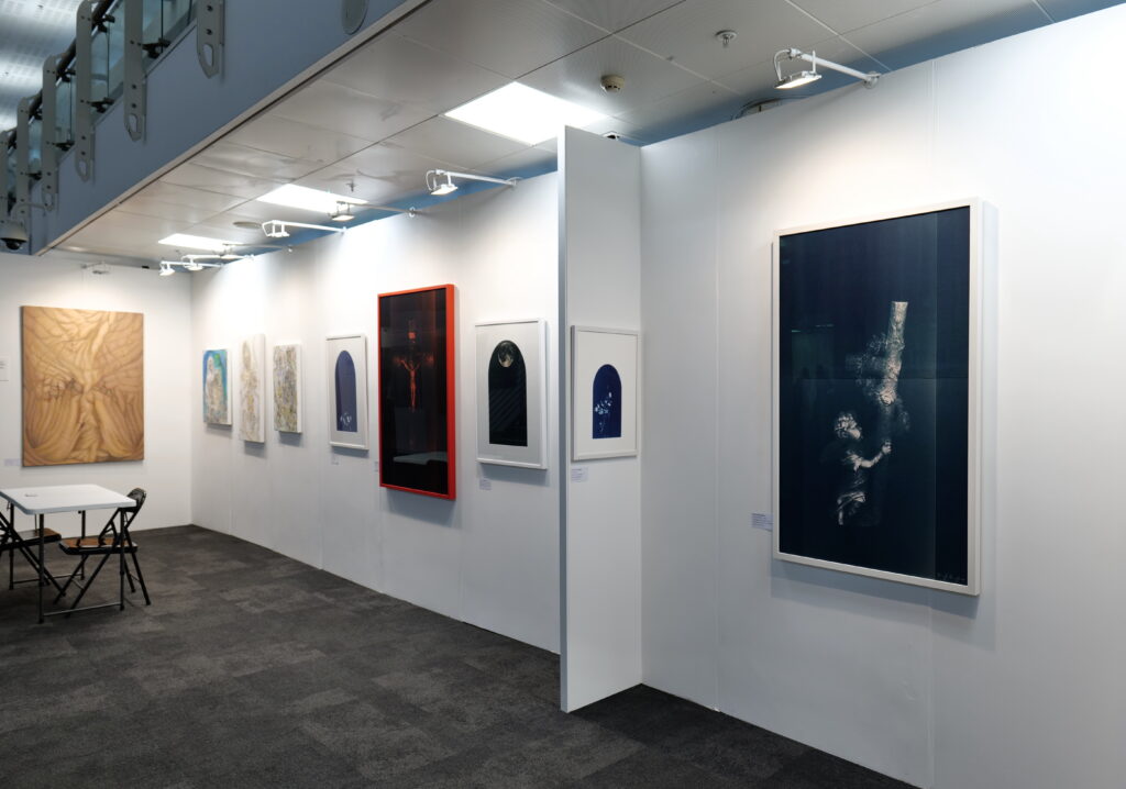 The stand at London Art Fair with works on all walls