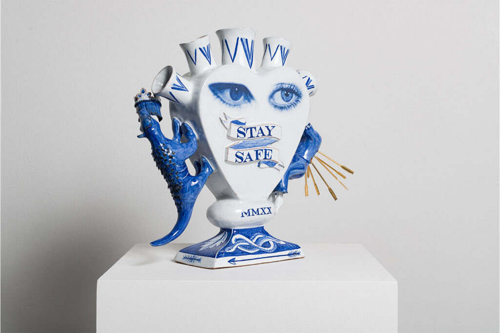 Meryl Donoghue, Tulipiere, a blue and white ceramic sculpture on a plinth